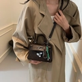 Retro dark brown Kelly style crossbody bag with leather texture and silver buckle - Brown