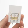 Golden 999 Angel Number pendant necklace in Gothic font with numeric meaning card - Gold (999)