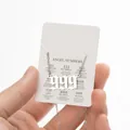 Silver 999 angel number pendant necklace with descriptive meaning card shown by hand - Steel (999)