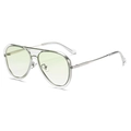 Classic aviator sunglasses featuring a silver metal frame and light green tinted lenses - C7