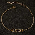 Bracelet de cheville doré en acier inoxydable avec Cancer en lettres gothiques - Cancer / Or