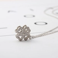 Elegant rotating four-leaf clover heart necklace with sparkling white rhinestones - White Gold