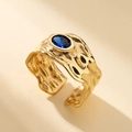 Irregular lava texture gold ring with oval blue gemstone and adjustable opening - Gold Base - Blue Zirconia