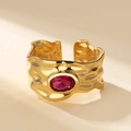 Adjustable golden lava ring with a pink zircon stone and unique hammered texture - Gold Base - Red Zirconia