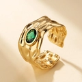 Adjustable gold lava ring with hammered texture and a green oval zircon gemstone - Gold Base - Green Zirconia