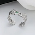 Minimalist silver-tone textured open ring with a vibrant green zircon stone center - Blue Zirconia (Adjustable) / White Gold