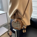 Brown round crossbody bag with brown checkerboard pattern and woven bunny charm - Quilted Coffee With Pendant