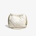 Creamy white quilted bucket bag with gold chain strap and adjustable metal ball detail - White