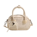 Elegant off-white marbled handbag featuring heart accents and a pearl bow charm - With Pendant / Off White