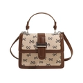 Sac bandoulière rétro en toile avec motifs nœuds et finitions en cuir marron de style épuré - Marron