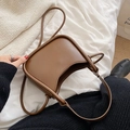 Minimalist caramel brown PU leather handbag with smooth texture and versatile shoulder strap - Brown