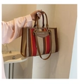 Detail of vintage canvas tote with multi-color stripes and brown leather handles - Large / Brown