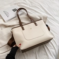 Large beige and brown contrast tote bag with wide shoulder strap in casual setting - Standard Type / White