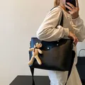 Minimalist black faux leather tote bag with teddy bear pendant and wide shoulder strap - With Bear Pendant / Black