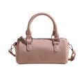 Schicke hellrosa gefaltete Zylindertasche mit Tragegriffen und verstellbarem Gurt - Rosa