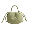 Borsa a secchiello verde menta trapuntata con cuciture bianche e tracolla a coulisse - Verde
