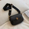 Retro black crossbody square bag featuring a vintage gold portrait emblem and wide strap - Black