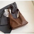 Brown litchi grain leather hobo bag with adjustable strap and golden hardware - Coffee