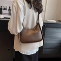 Brown leather underarm bag with fashion bag text print for minimalist style - Brown