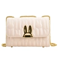 Pink quilted crossbody bag with rabbit ear lock and gold chain strap for women - Beige