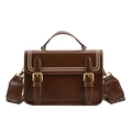 Vintage brown leather crossbody bag with studded gold hardware and a wide woven strap - Brown