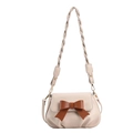 Chic cream-colored crossbody bag featuring a brown leather bow and braided shoulder strap - Beige and Brown