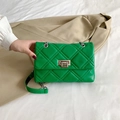 Quilted green crossbody bag with silver chain strap and metal turn-lock closure - Green