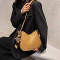 Caramel brown hobo bag with rabbit charm and adjustable strap for women - Khaki With Rabbit Pendant