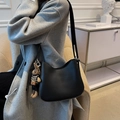 Classic black leather hobo bag with a stylish houndstooth bear pendant detail - Black With Rabbit Pendant