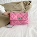 Pink quilted shoulder bag with silver chain strap and metallic twist-lock closure - Pink
