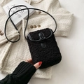 Black faux shearling mini crossbody bag with toggle closure and thin shoulder strap - Long Fur Black