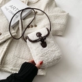 Mini white faux shearling crossbody bag with dark brown toggle closure and leather trim - Long Fur White