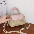 Straw crossbody bag in beige and pink with ruffled handle and flower charm detail - Pink