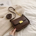 Dark brown mini square crossbody bag with gold geometric lock and dual shoulder straps - Brown