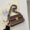 Brown vintage crossbody bag with studded flap and colorful ethnic woven wide strap - Brown