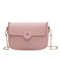 Minimalist light pink crossbody bag with unique donut decor and gold chain strap - Pink