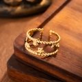 Goldener zweischichtiger Perlenring mit polierten Sternen und verstellbarem Design - Gold