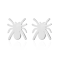 Macro detail of polished stainless steel spider stud earrings with reflective silver finish - Steel