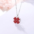 Rotating silver necklace with a four-leaf clover pendant set in sparkling red crystals - Necklace-Red