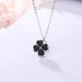 Rotating four-leaf clover necklace with black heart-shaped stones and silver chain - Necklace-Black