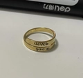Macro detail of 'never give up' engraved on a gold adjustable wrap ring for women - Never Give Up Style (081) / Gold