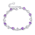 Pulsera de plata 925 con cristales de corazón púrpura y eslabones de corazón sobre fondo blanco - Púrpura (XL0002)