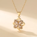 Golden clover pendant necklace with marquise-cut zircons and delicate pavé petals - Necklace / Gold