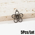 Detail view of black hollow flower charms in a 5-piece lot set for DIY jewelry - Five-Petal Flower Design (535) / 5 Pieces / Black