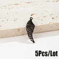 Close-up of black hollow angel wing pendants on stone, set of 5 pieces for DIY jewelry - 5Pcs/Lot / Black