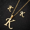 Golden stainless steel jewelry set featuring elegant cursive letter K necklace and studs - K Gold
