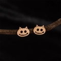 Gothic rose gold stainless steel cat stud earrings displayed on a rustic branch - Rose Gold