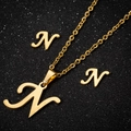 Golden stainless steel jewelry set with cursive letter N pendant necklace and matching earrings - Letter N Gold