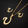 Polished gold stainless steel jewelry set featuring letter U pendant necklace and earrings - Letter U Gold