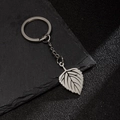 Silver stainless steel leaf keychain with detailed veins on textured stone background - Veined Texture Leaf Style (206)